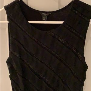 Fun for holiday: Sleeveless black top w sequins.